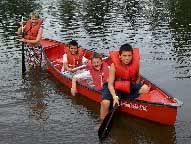 Kids having fun in a canoe